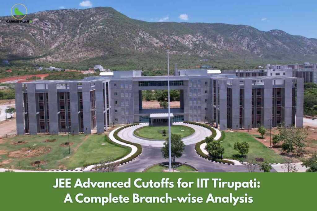 The image displays the main building of IIT Tirupati, a modern, symmetrical gray structure set against a backdrop of green hills and a blue sky with scattered clouds. The foreground features a neatly landscaped circular driveway lined with grass and small trees, leading to the entrance of the building. At the top left corner is a green bird logo labeled “CAREER PLAN B.” Across the bottom is a wide green overlay containing the bold white title: “JEE Advanced Cutoffs for IIT Tirupati: A Complete Branch-wise Analysis.” The image conveys information regarding branch-wise cutoff ranks for JEE Advanced admissions at IIT Tirupati.