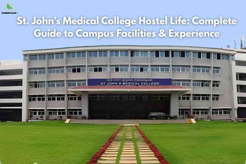 Front view of St. John’s Medical College building, a modern multi-story structure with rows of glass windows and a large entrance canopy. A well-maintained green lawn with a paved walkway and red flower borders leads up to the entrance. The Career Plan B logo is at the top left, and across the sky, bold white text reads 'St. John’s Medical College Hostel Life: Complete Guide to Campus Facilities & Experience.'